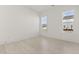 Bright, empty bedroom featuring clean, minimalist design and ample natural light at 509 Rhythm St, Summerville, SC 29486
