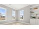 Bedroom with built-in shelving and windows offering pleasant neighborhood views at 509 Rhythm St, Summerville, SC 29486
