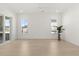 Bright open living room with hardwood flooring and views to the outdoors at 509 Rhythm St, Summerville, SC 29486
