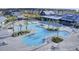 Aerial view showcasing a luxurious community pool with palm trees and ample lounging space at 509 Rhythm St, Summerville, SC 29486