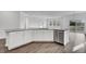 Kitchen island with granite counters, stainless steel dishwasher and a view into the dining area at 511 Verdi Dr, Summerville, SC 29486