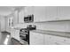Well-appointed kitchen showcasing granite countertops, a stainless steel gas range, and subway tile backsplash at 511 Verdi Dr, Summerville, SC 29486