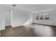 Bright living room with hardwood floors, lots of natural light from large windows, and a fresh, airy ambiance at 511 Verdi Dr, Summerville, SC 29486
