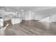Spacious living area with an open floor plan and hardwood floors, flowing into the kitchen at 511 Verdi Dr, Summerville, SC 29486