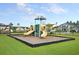 Community playground area with multiple slides and climbing structures for children to enjoy at 511 Verdi Dr, Summerville, SC 29486