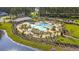 Aerial view of the community pool, featuring lounge chairs, umbrellas, a covered pavilion, and restrooms at 511 Verdi Dr, Summerville, SC 29486