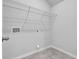 Walk-in closet offering ample storage space with wire shelving, neutral paint, and easy access for organization at 511 Verdi Dr, Summerville, SC 29486