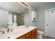 Well-appointed bathroom with double sinks, a soaking tub, and a separate glass shower at 520 Sanders Farm Ln, Wando, SC 29492