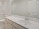 Bathroom with a white vanity, quartz countertop, large mirror, and a bathtub at 525 Verdi Dr, Summerville, SC 29486