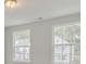 Bedroom with two windows providing an view of the neighborhood at 525 Verdi Dr, Summerville, SC 29486