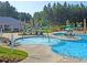 Lindera community pool with lounge seating and palm tree umbrellas at 525 Verdi Dr, Summerville, SC 29486