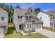 Charming two-story home features a modern design, attached garage, and landscaped front yard at 525 Verdi Dr, Summerville, SC 29486