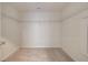 Empty walk-in closet with neutral carpet, white walls, and white wire shelving at 525 Verdi Dr, Summerville, SC 29486