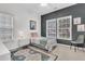Bright bedroom with ample natural light, featuring a comfortable bed and stylish decor at 5408 Overland Trl, North Charleston, SC 29420