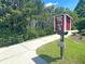Community library with free books available for residents on a sidewalk at 5408 Overland Trl, North Charleston, SC 29420