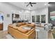 Spacious living room with an open layout and views into the kitchen and backyard at 5408 Overland Trl, North Charleston, SC 29420