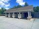 Organized mailbox pavilion with stone accents and covered parking for residents' convenience at 5408 Overland Trl, North Charleston, SC 29420
