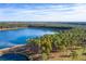 Breathtaking aerial view of a lake bordered by dense forest at 552 Richfield Way, Summerville, SC 29486