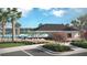 Resort-style community pool featuring ample lounge seating, shaded areas, and lush landscaping at 552 Richfield Way, Summerville, SC 29486