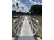 Inviting dock with metal railings providing access to a calm body of water at 552 Richfield Way, Summerville, SC 29486