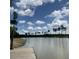 Scenic lake view with private dock access under a bright blue, cloudy sky at 552 Richfield Way, Summerville, SC 29486