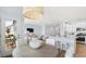 Open-concept living space with dining area, kitchen, and cozy living room at 552 Richfield Way, Summerville, SC 29486