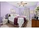 Bedroom featuring carpet flooring, light purple walls and a gray bed frame at 5529 Golden Rice Ln, Ravenel, SC 29470