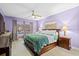 Bedroom with a ceiling fan, large window, and tile floors at 5529 Golden Rice Ln, Ravenel, SC 29470