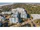 Aerial view of a luxury resort near the beach with manicured landscaping, pools, and upscale amenities at 5804 Palmetto Dr # A-208, Isle of Palms, SC 29451