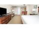 Cozy bedroom with an adjoining kitchen area offers comfortable seating and modern amenities at 5804 Palmetto Dr # A-208, Isle of Palms, SC 29451