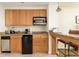 Modern kitchen features updated appliances and bar seating at 5804 Palmetto Dr # A-208, Isle of Palms, SC 29451