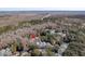 Aerial view of the townhome complex surrounded by trees and marshland at 60 Fenwick Hall Allee # 728, Johns Island, SC 29455