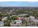 Aerial view of property featuring pool, lush trees and multiple buildings at 60 Fenwick Hall Allee # 728, Johns Island, SC 29455
