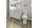 Modern bathroom featuring a marble vanity, sleek fixtures, and ample storage at 60 Fenwick Hall Allee # 728, Johns Island, SC 29455