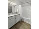 Bathroom featuring a marble countertop, bright lighting, and a shower-over-tub combination at 60 Fenwick Hall Allee # 728, Johns Island, SC 29455