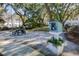Community area featuring a lending library, picnic table, and lush landscaping at 60 Fenwick Hall Allee # 728, Johns Island, SC 29455