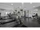 Well-equipped exercise room featuring multiple treadmills, machines and mirrored wall at 60 Fenwick Hall Allee # 728, Johns Island, SC 29455