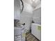 Utility room featuring a stacked washer and dryer and a water heater at 60 Fenwick Hall Allee # 728, Johns Island, SC 29455