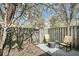 Fenced backyard offers a seating area, privacy, and space to relax and enjoy the outdoors at 6244 Lucille Dr # B, North Charleston, SC 29406