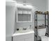 Well-lit bathroom featuring a sleek vanity, modern fixtures, and practical storage at 6244 Lucille Dr # B, North Charleston, SC 29406