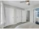 Bedroom features neutral walls, ceiling fan and closet and bathroom access for added convenience at 6244 Lucille Dr # B, North Charleston, SC 29406