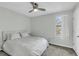Bedroom featuring neutral walls, carpet, ceiling fan and a window offering natural light and fresh air at 6244 Lucille Dr # B, North Charleston, SC 29406