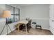 Bright dining area featuring a table with bench, large windows and modern light fixture at 6244 Lucille Dr # B, North Charleston, SC 29406