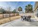 Landscaped backyard area with patio, privacy fence, and outdoor seating, great for entertaining at 7034 Lanier St, Hanahan, SC 29410