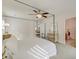 Spacious primary bedroom with a canopy bed and an open view to the ensuite bathroom at 7034 Lanier St, Hanahan, SC 29410