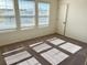 Sunlit bedroom features lots of natural light and plush carpeting at 744 Pisces Ln, Summerville, SC 29486