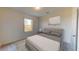 Comfortable bedroom with neutral walls, carpet, and a window providing natural light at 744 Pisces Ln, Summerville, SC 29486