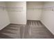 Empty walk-in closet with new carpeting and wire shelving at 744 Pisces Ln, Summerville, SC 29486