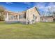 Backyard with a covered porch attached to the house at 7461 Church Hill Rd, Hollywood, SC 29449