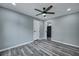 Comfortable bedroom with hardwood floors and a ceiling fan at 7461 Church Hill Rd, Hollywood, SC 29449